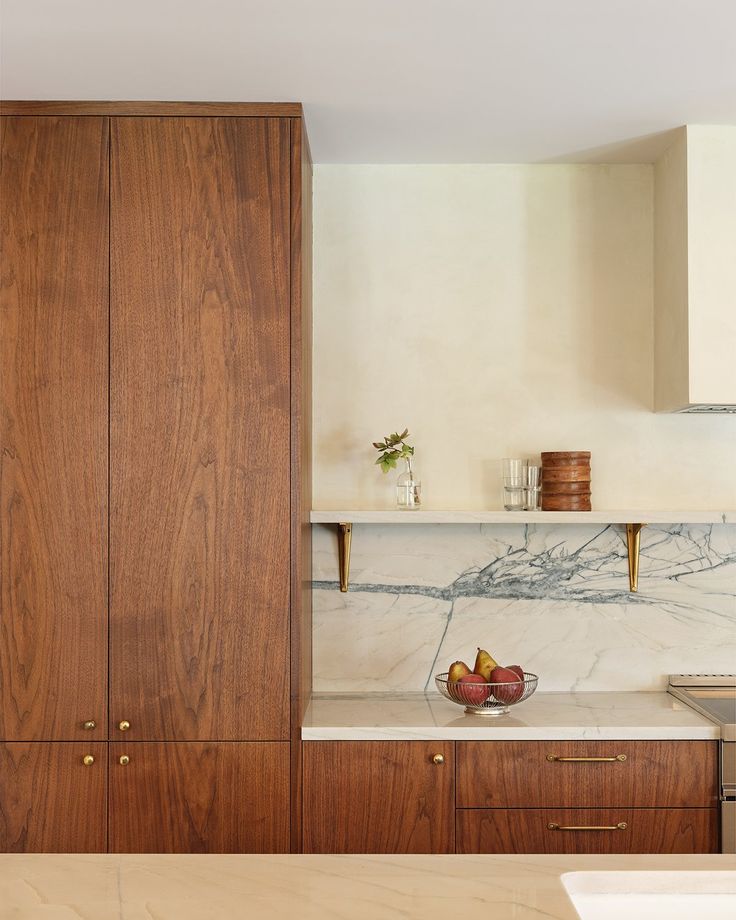 Custom walnut cabinetry with marble backsplash in Billings Montana.